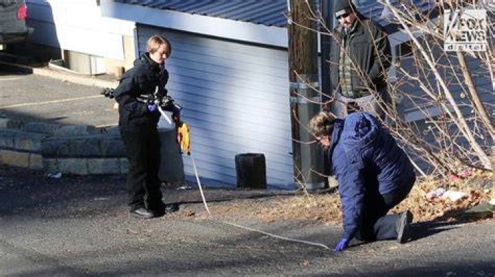 A forensics team returned to the street in front of the Idaho crime