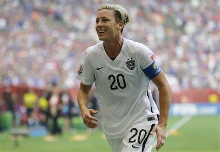 Abby Wambach "Proud" of Her NowViral Kiss With Wife Sarah Huffman