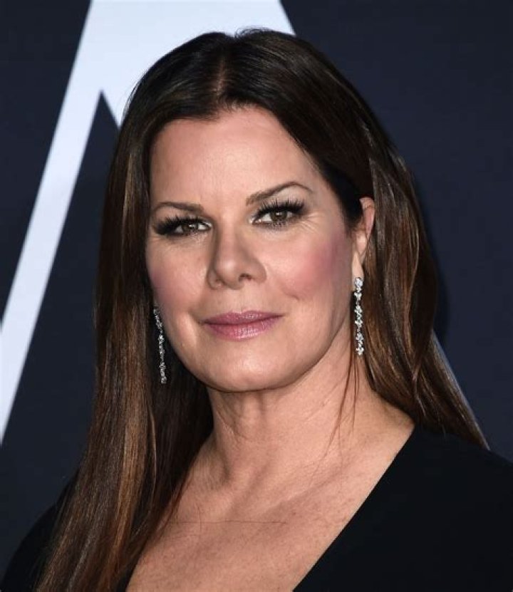 Actress Marcia Gay Harden and her husband Thaddaeus Scheel arrive at