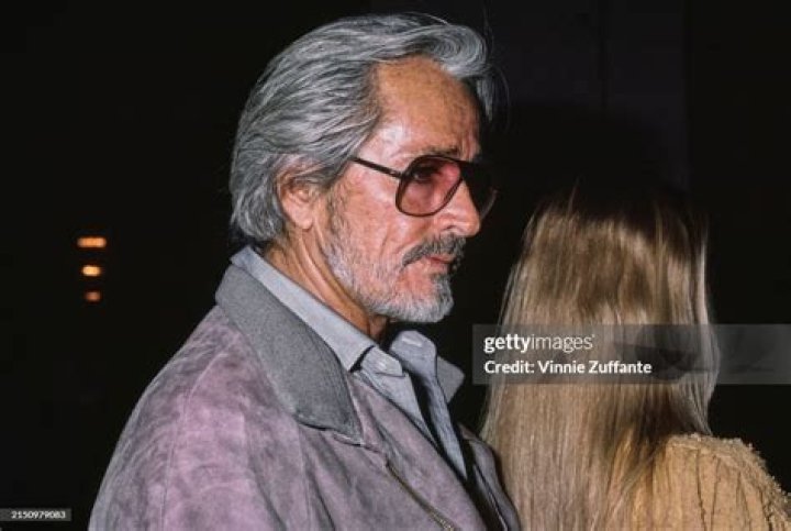 American film director John Derek and his wife, actor Linda Evans