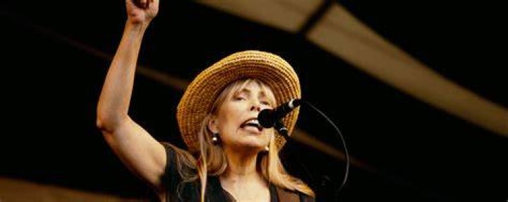 American singer, songwriter and musician Emmylou Harris with her