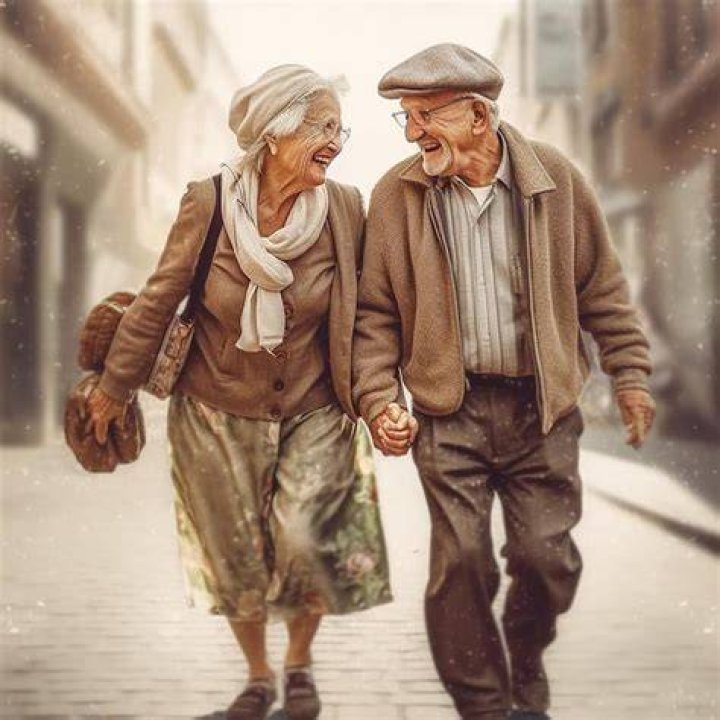 an older man and woman dressed in formal wear