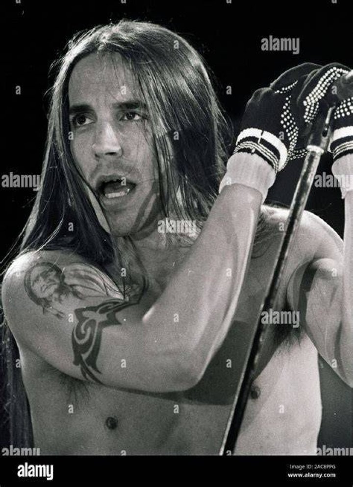 Anthony Kiedis of the Red Hot Chili Peppers and girlfriend, Heather