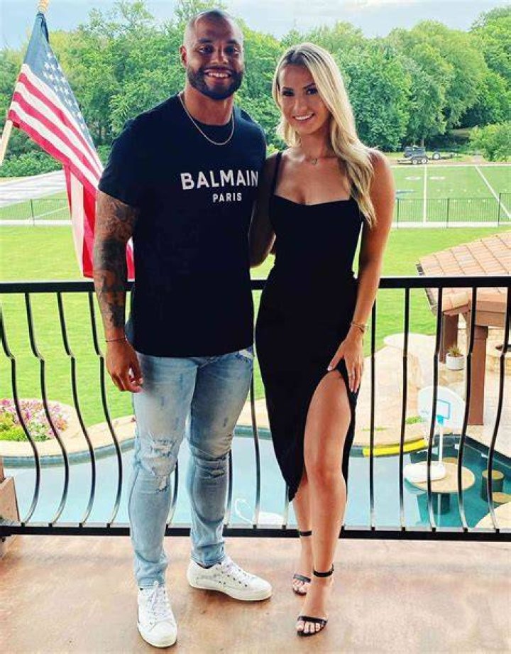 Dak Prescott and Natalie Buffett kiss after Cowboys win