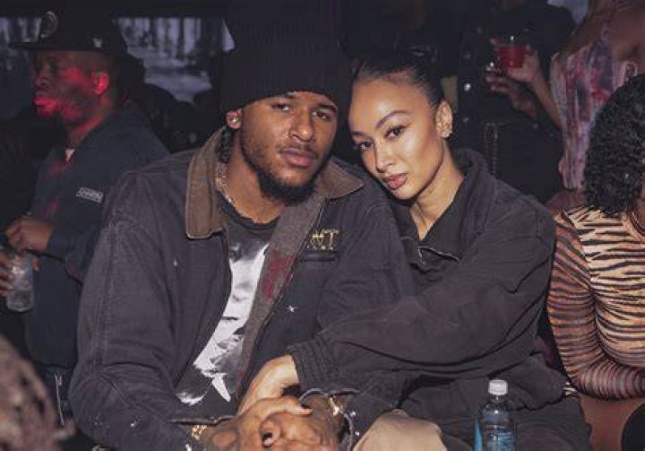 Draya Michele steals a kiss from fianc&eacute; Orlando Scandrick Draya