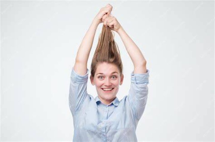 Fairchild Holding Hair Up Photo Print 8 x 10 定番