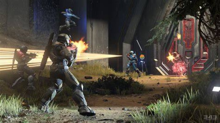 Halo Infinite multiplayer screenshot showing an orange Spartan