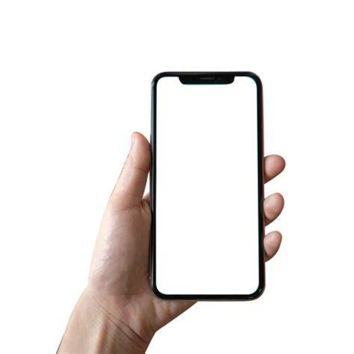 Hand holding a phone with Instagram logo on it