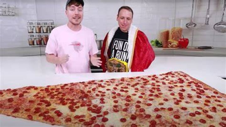 Joey Chestnut and Mr Beast, world's largest pizza slice