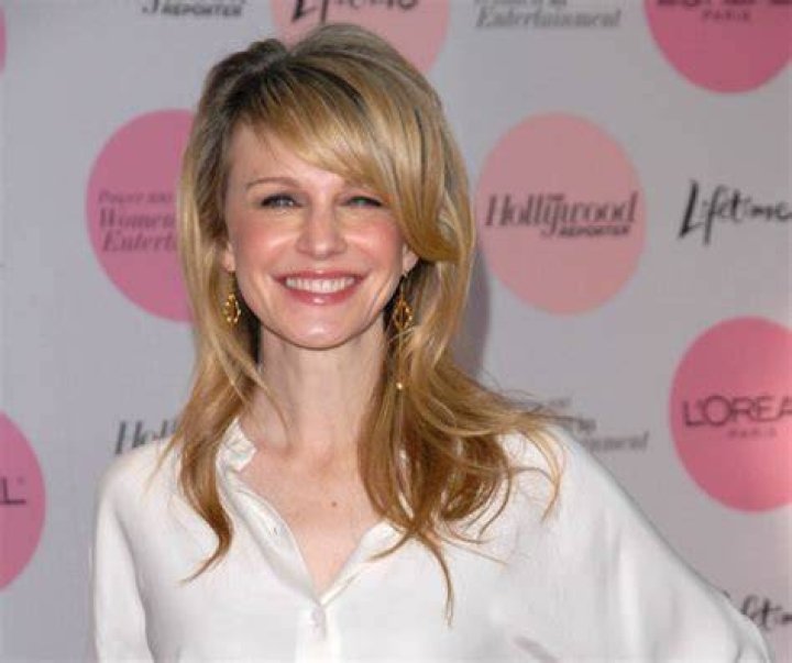 Kathryn Morris wearing her hair short in a trendy pixie cut