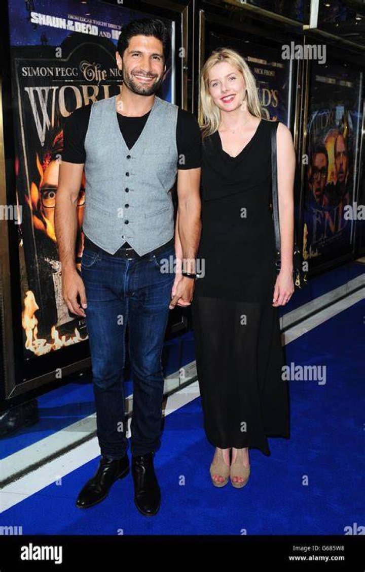 Kayvan Novak and partner Rachael arriving for the world premiere of The