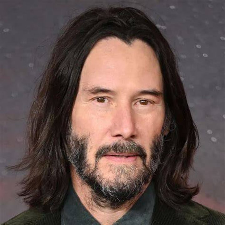 Keanu Reeves from 'The Matrix' Poses on Red Carpet with His Beautiful
