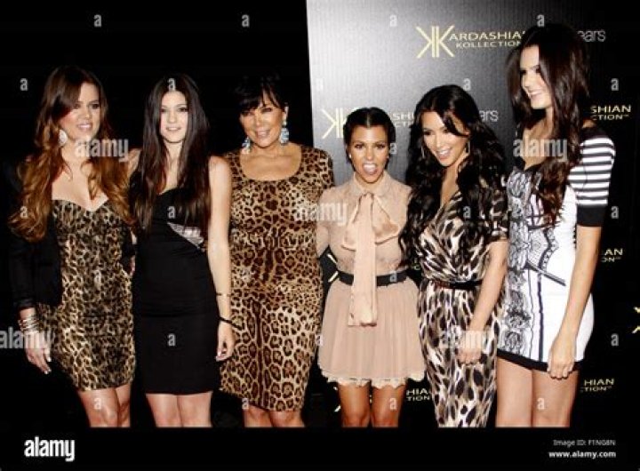Kim, Kourtney, Khloé and Kylie all dressed up as Kris Jenner to