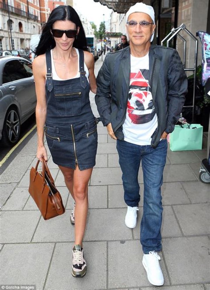 Liberty Ross displays toned legs as she steps out in playful denim
