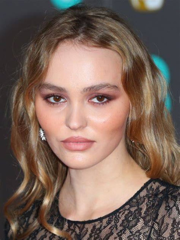 LilyRose Depp in Paris with her older boyfriend and familyLainey