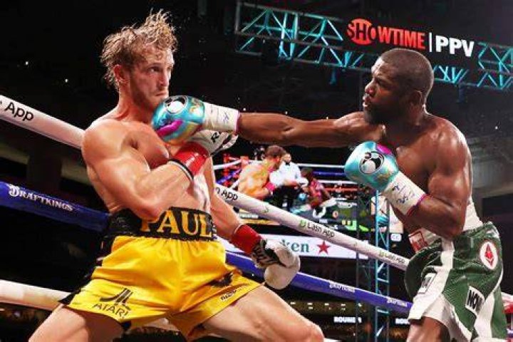 Logan Paul hits Mayweather with a powerful punch