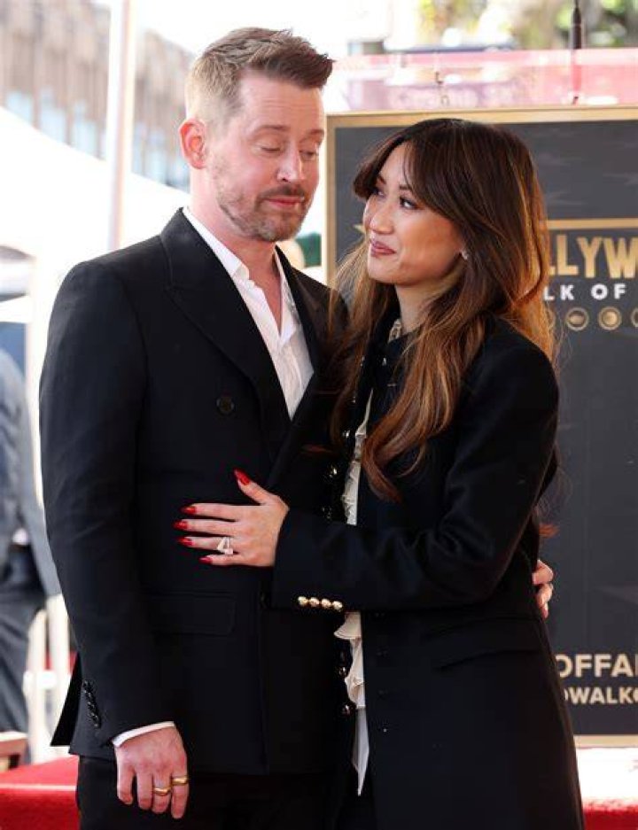 Macaulay Culkin, Brenda Song spark marriage rumors as she wears band