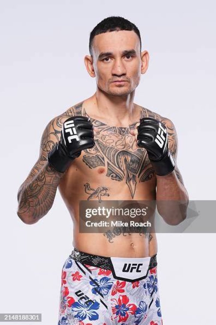 Max Holloway poses for a portrait with his wife, Kaimana Pa'aluhi