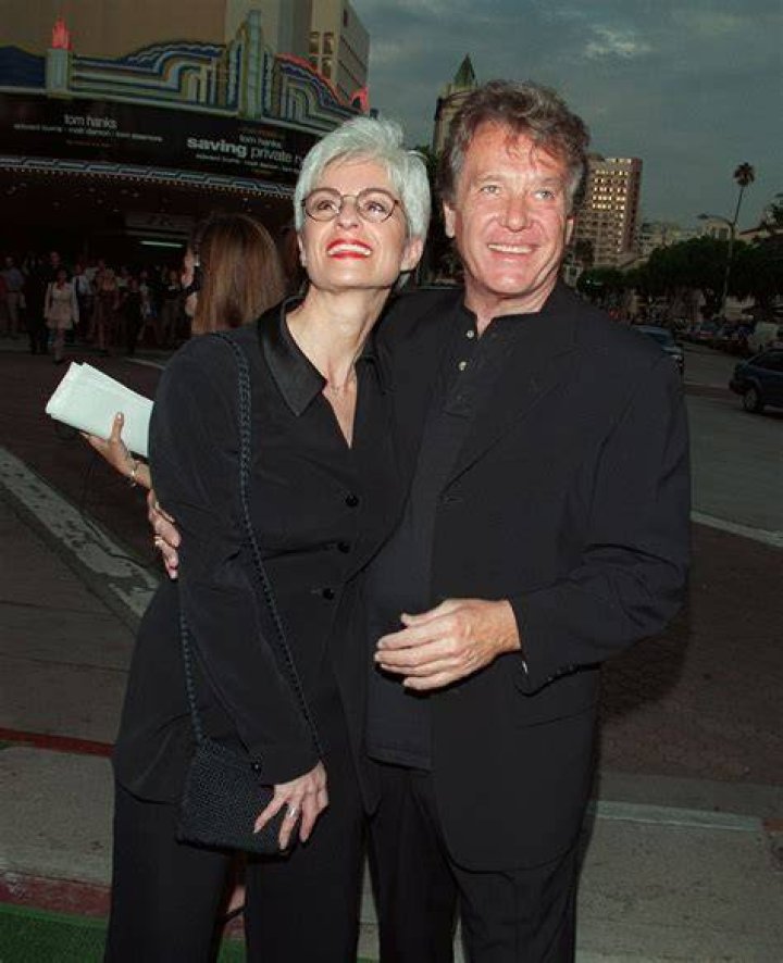 Michael Cole & his wife Shelley Funes arrives at the Mann's Village