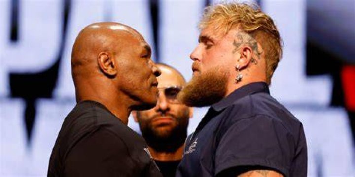 Mike Tyson chatting to Jake Paul