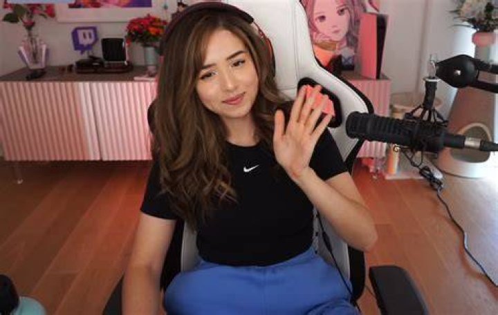 Pokimane and Alinity pose for the camera.