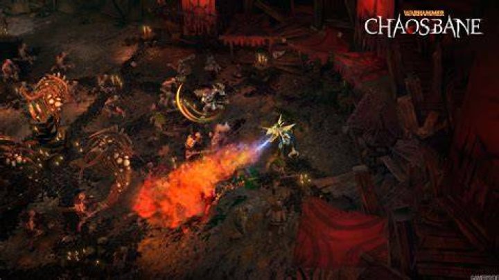 Screenshot from Warhammer Chaosbane showing combat in a dark area