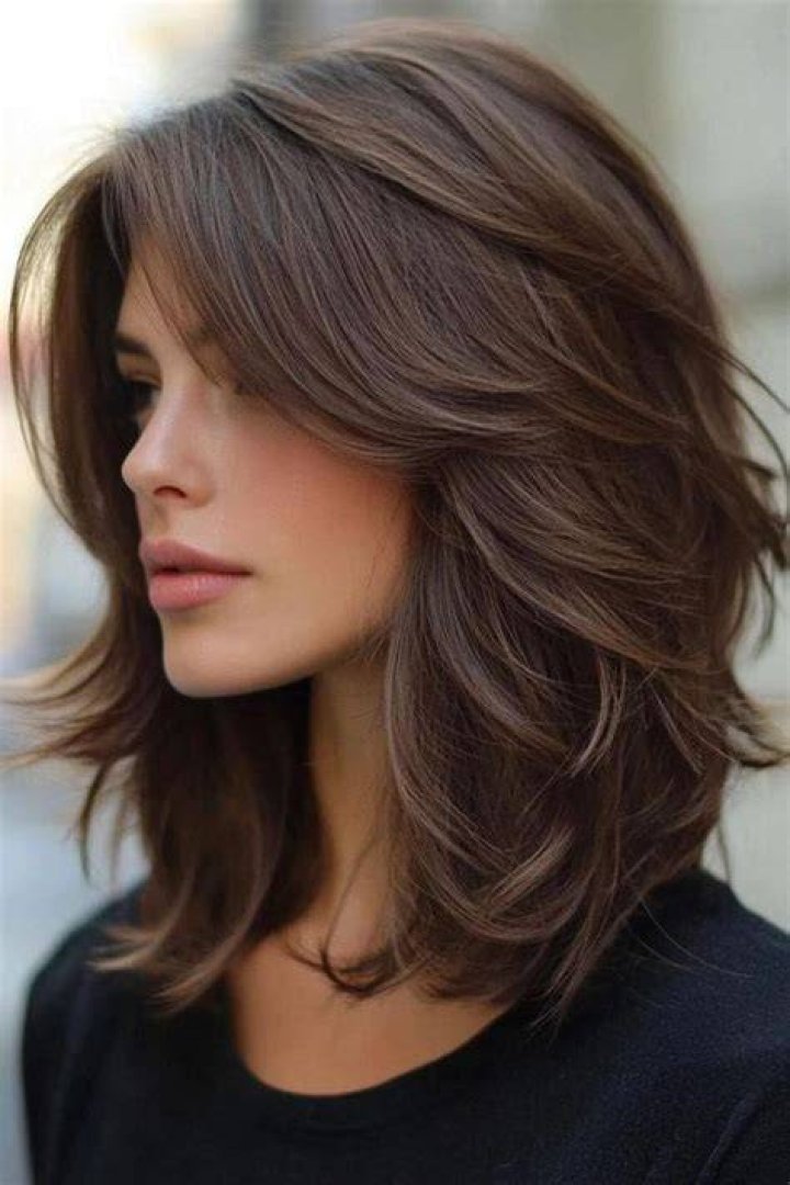 Shoulder Length Feathered Hair Wavy Haircut