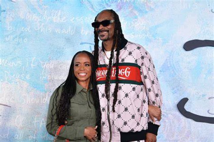 Snoop Dogg Shares Kiss with Wife Shante Braudus in Throwback NBC Insider