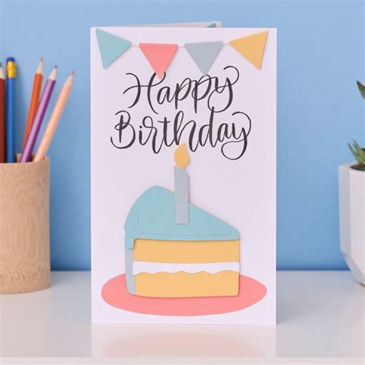 the birthday card is decorated with images of people and flowers