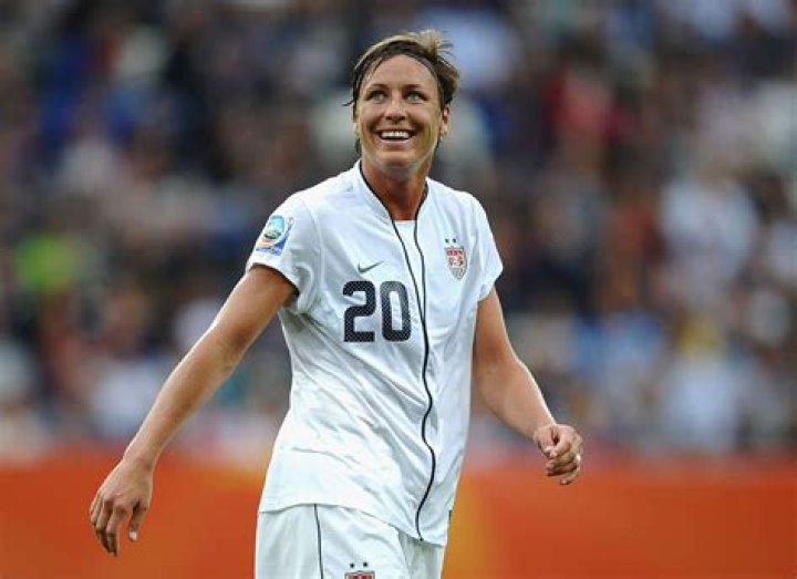 This Photo Of Abby Wambach Kissing Her Wife Sarah Huffman After World