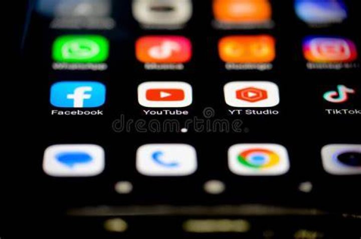 TikTok logo and other apps on a phone