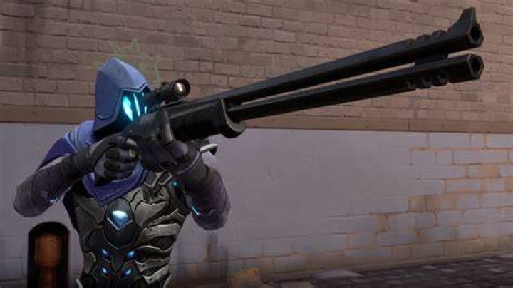 Valorant man with large sniper weapon stands on a navy background with VALORANT written on it